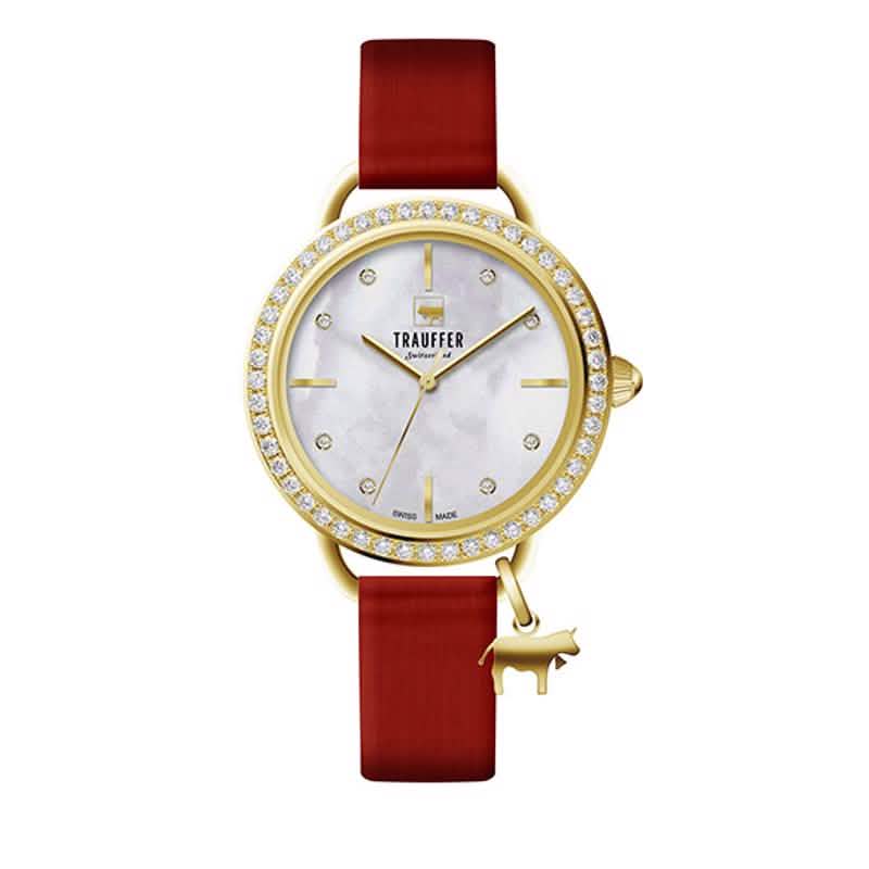 Trauffer Damenuhr mit goldfarbenem Gehäuse, rotem Band, Perlmutt-Zifferblatt und funkelnder Steinlünette – Swiss Made mit Kuh-Charm
